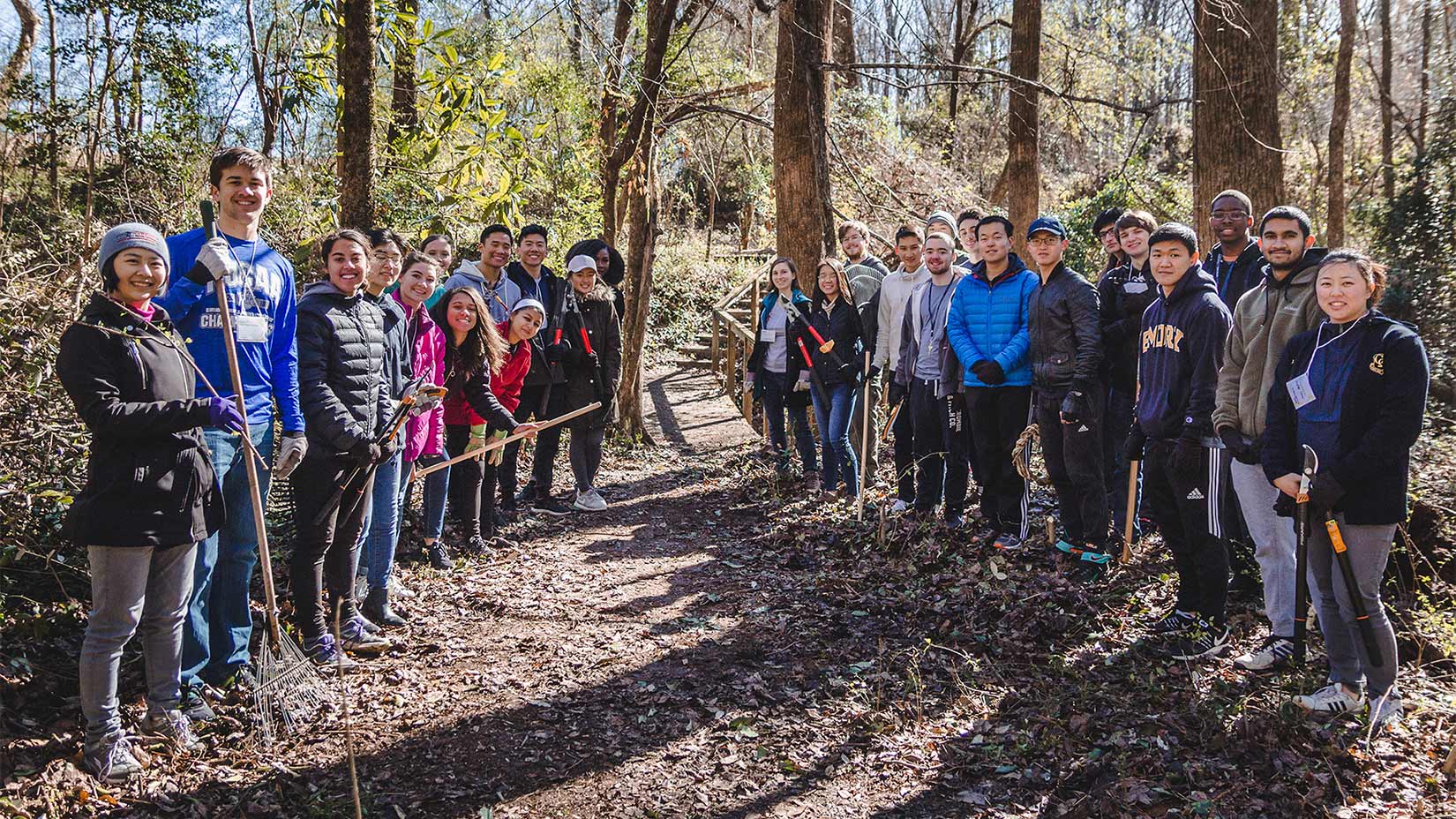 Students help with landscape clean up.