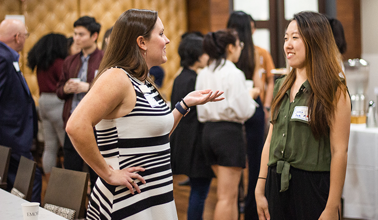 Oxford alumna Kinsey McMurtry talks with second-year student Jessica Park during a recent networking event.