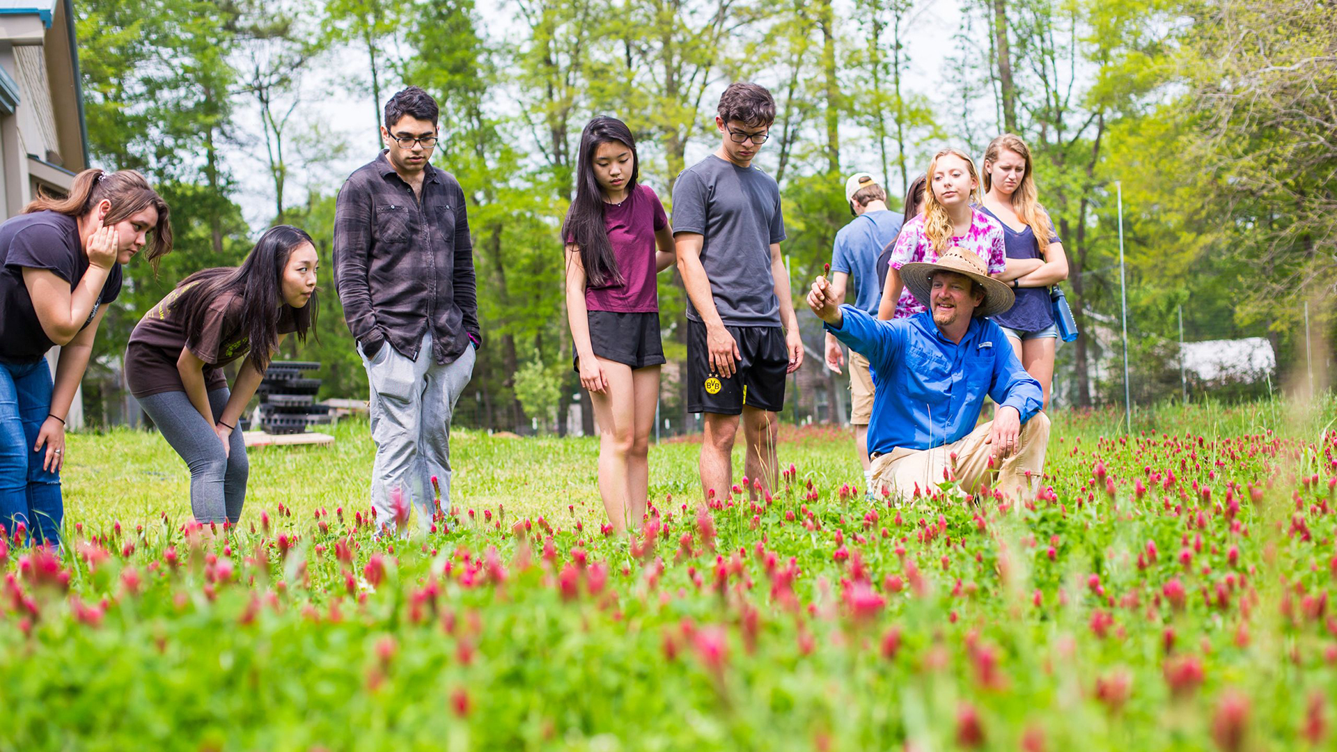 Students listen to farmer and educator Daniel Parson.