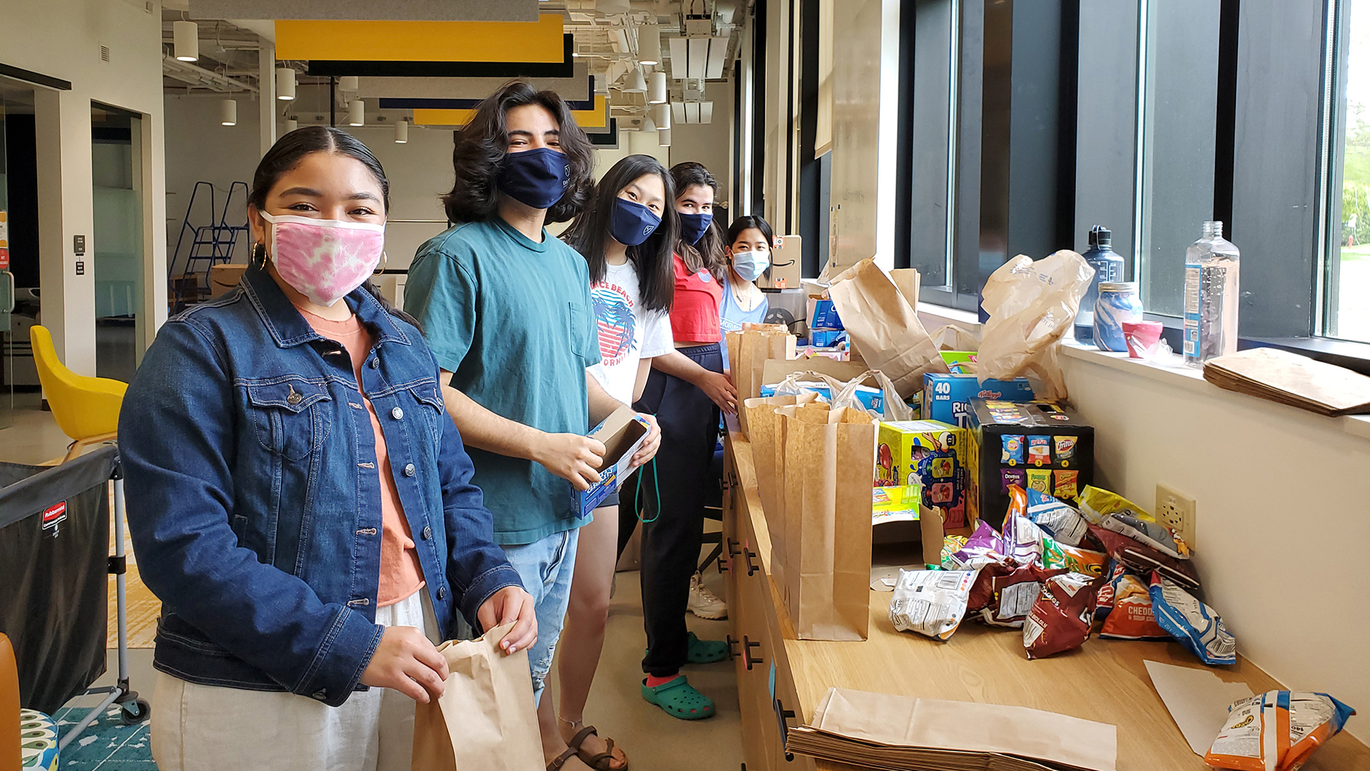 Oxford students pack food in the Oxford Student Center